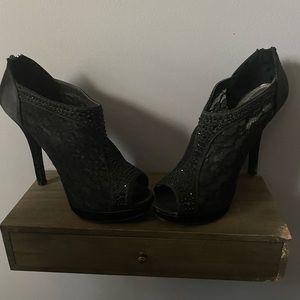 Back zip stiletto heel lace look shoe. Heel is 3+”